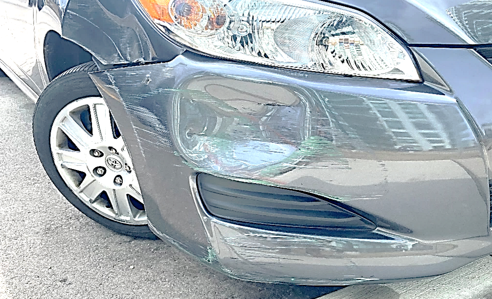 Figure 1 - View of the excessive paint transfers that result from contact with a painted stationary object such as a wall/pole.