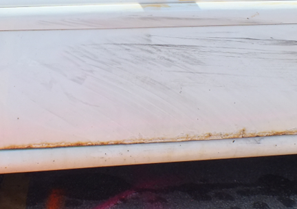 Figure 4 - View of rotational tire marks resulting from a vehicle-to-vehicle sideswipe collision.